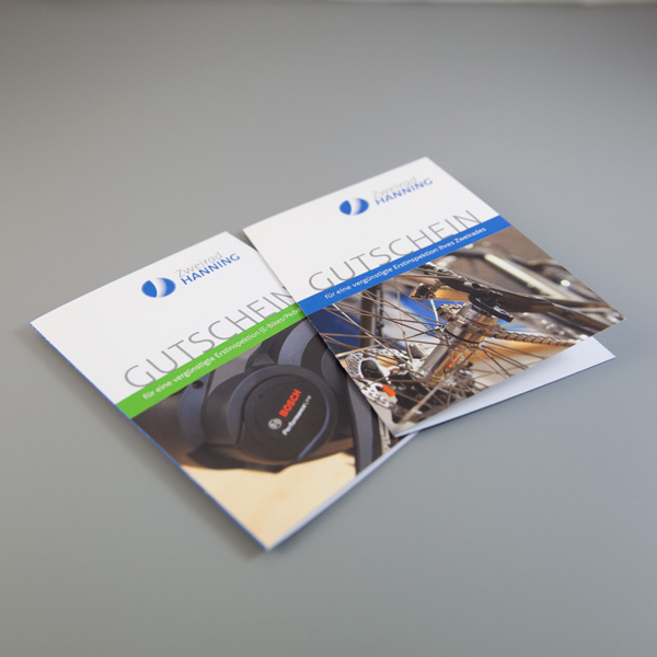 Design einer Gutscheinkarte für einen Zweiradhändler